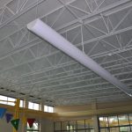 sprinkler-pipe-painted-to-match-structure-over-pool